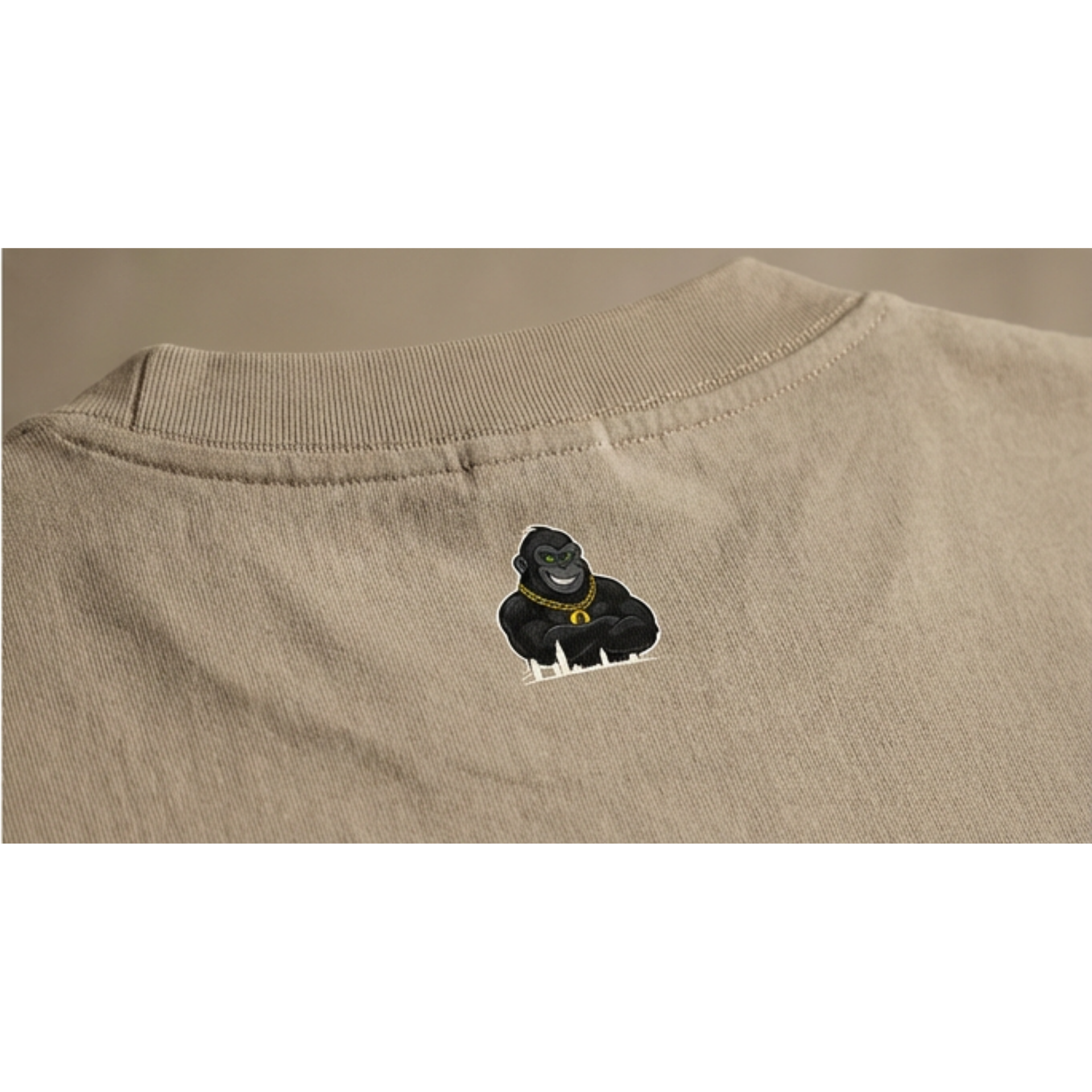 SAND TEE back logo